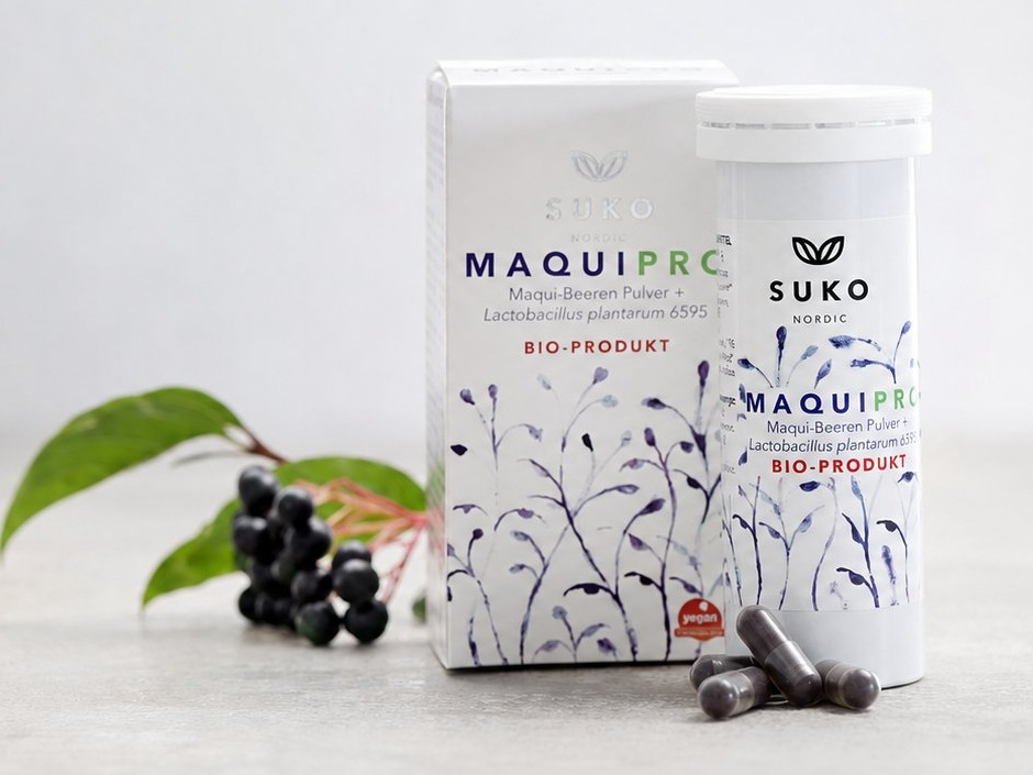MaquiPro® box, tube and vegetarian capsules with fresh maqui berries.